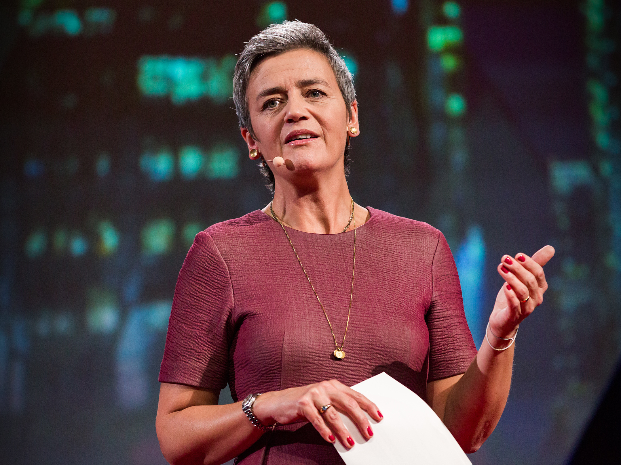 caption: Margrethe Vestager on the TED stage.