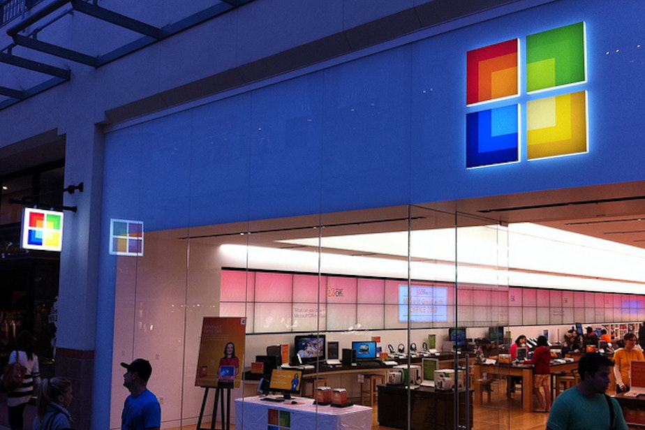 caption: Brick and mortar retail like this Microsoft store are still big compeition for online shopping.