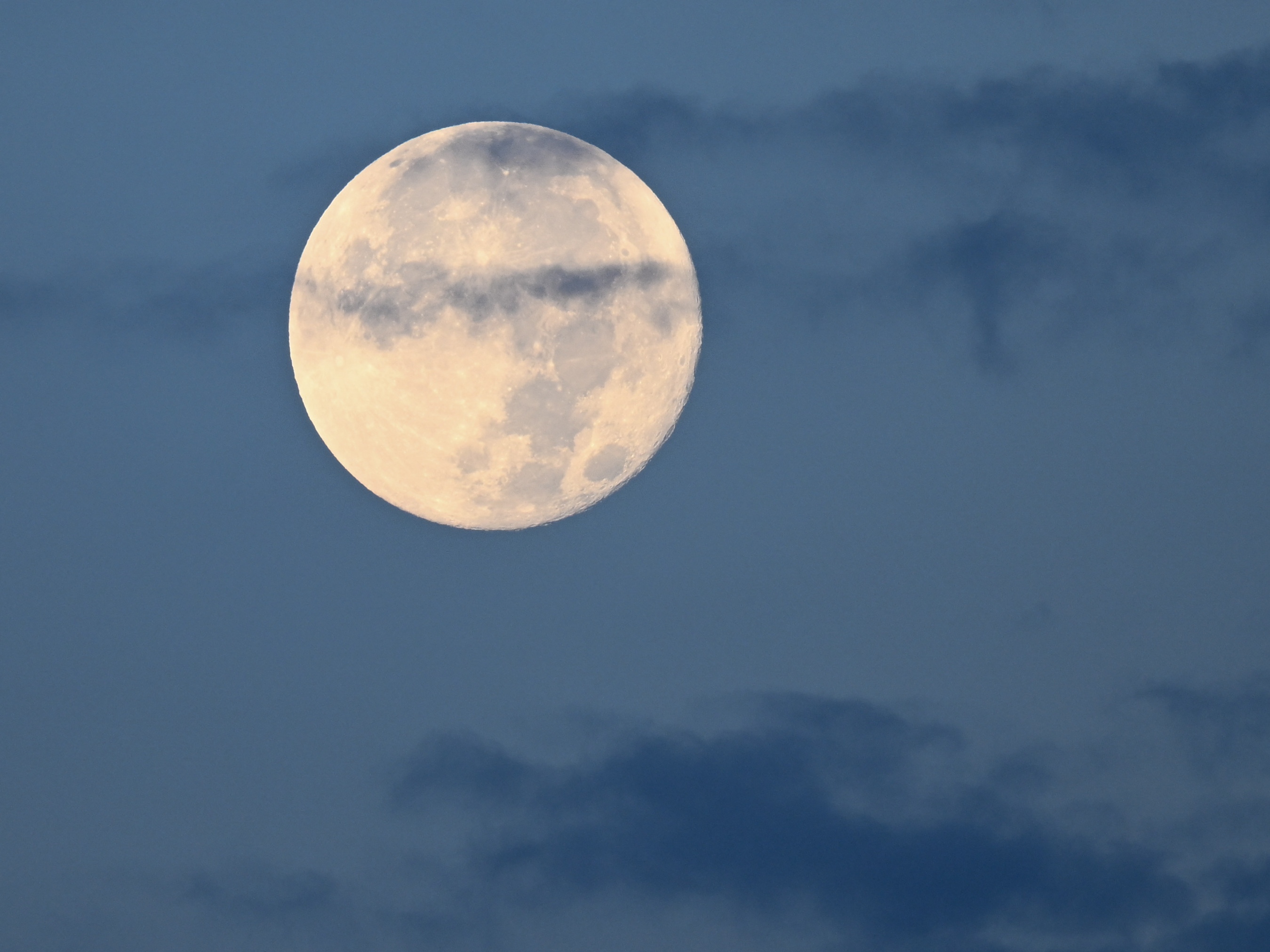 caption: The sturgeon supermoon over Vanderbilt University's West End Tower in Nashville, Tenn., in August 2023.