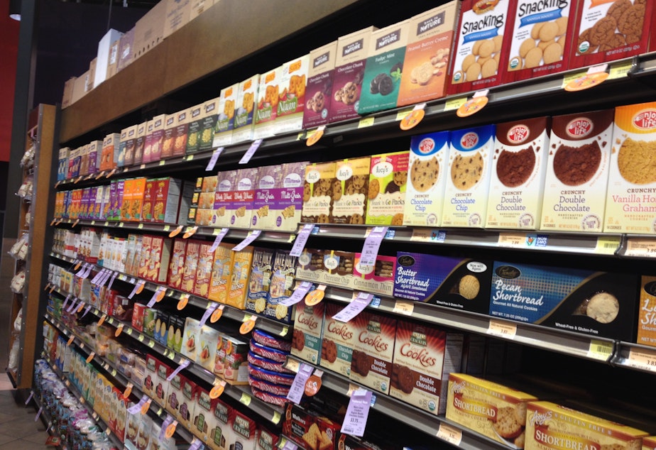 caption: Seventy percent of processed foods sold in the U.S. contain genetically engineered ingredients like soy, corn, and sugar. Even at PCC, considered a beacon of organic products, is not entirely GMO-free.