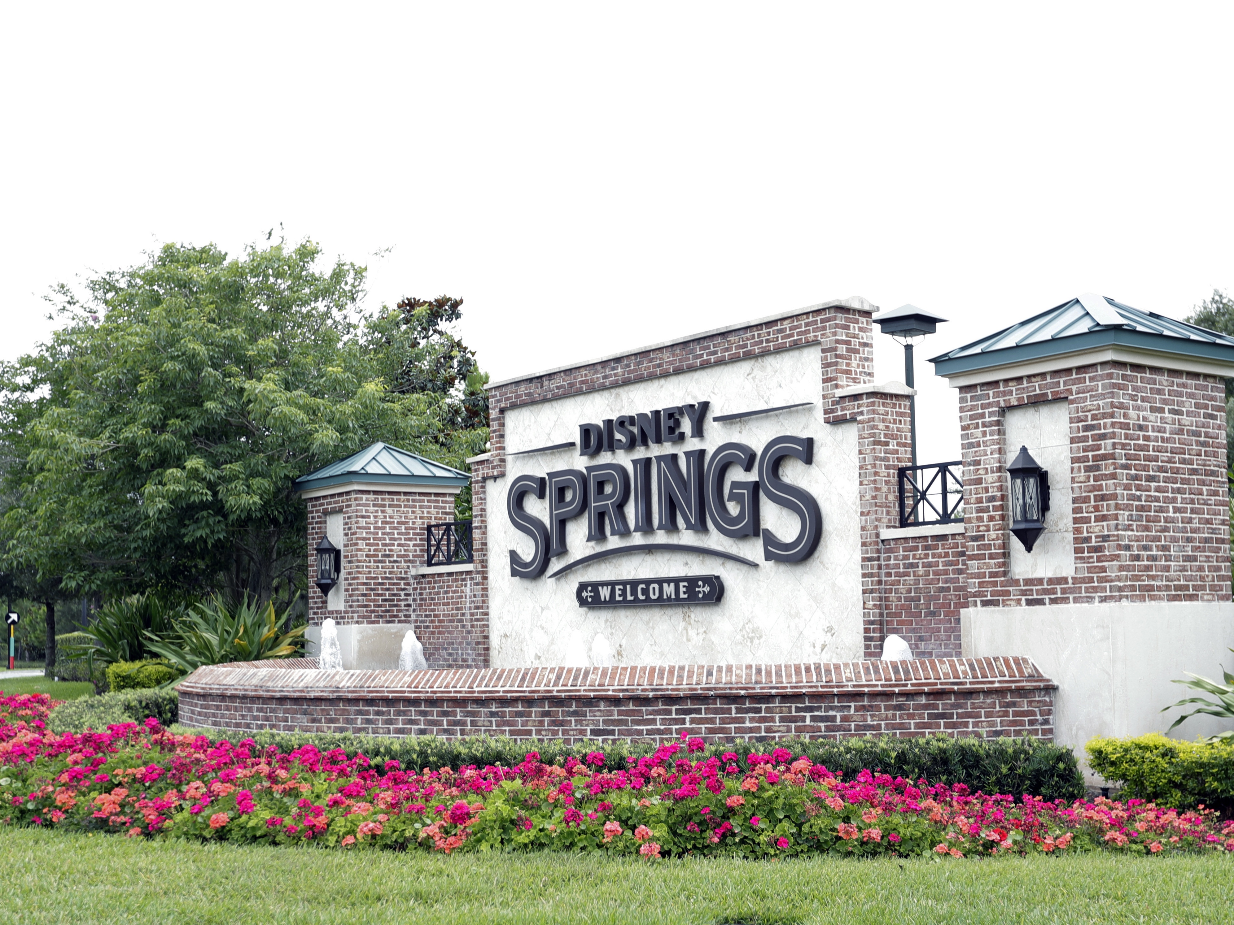 caption: The husband of a New York doctor who died shortly after dining at a Disney Springs restaurant last year has accused Walt Disney Parks and Resorts of negligence in a lawsuit. Disney has responded with a motion to compel arbitration rather than litigate in court. 