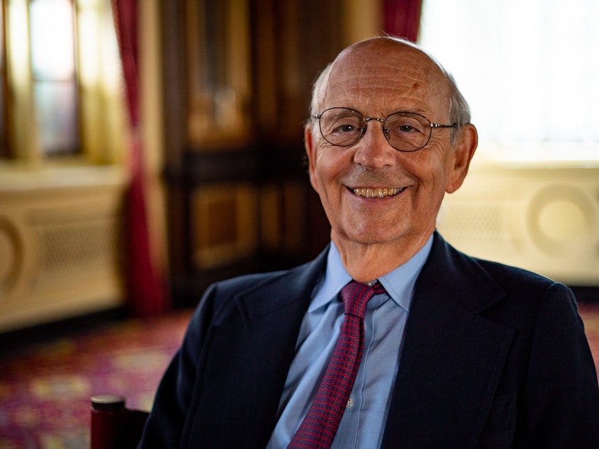 caption: Justice Stephen Breyer welcomes the resumption of in-person oral arguments at the high court this fall.