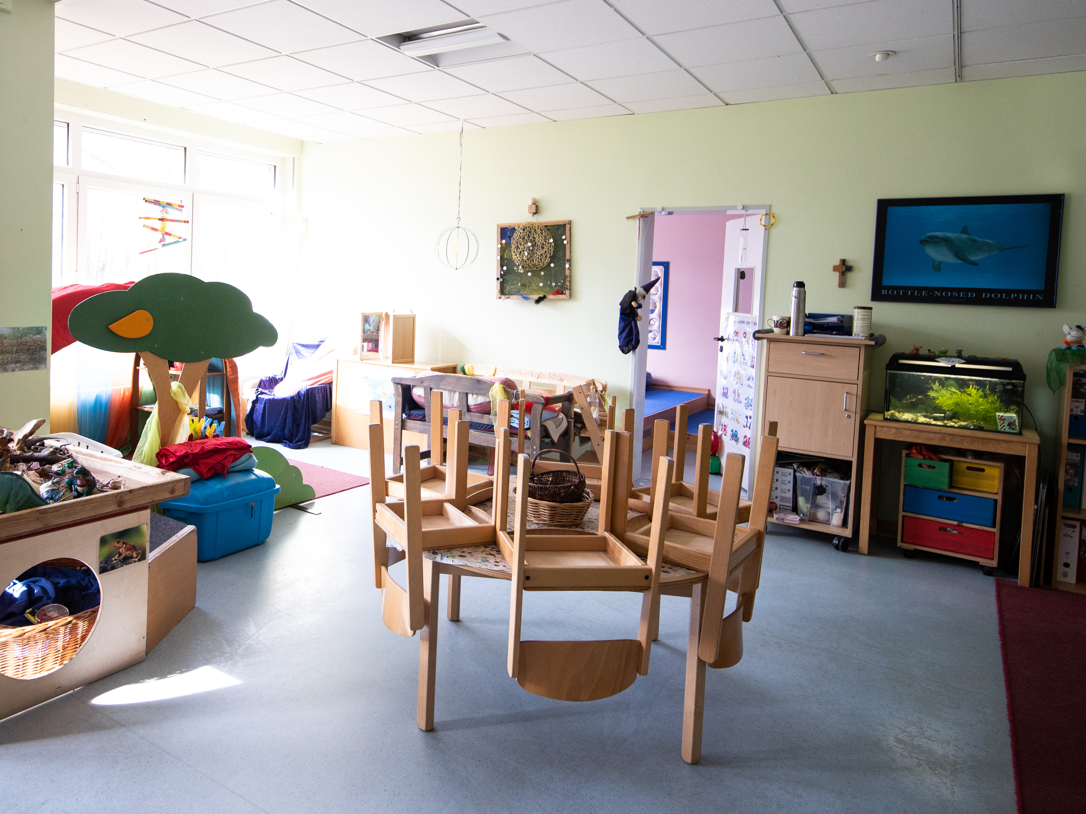 caption: The pandemic shuttered day-care centers, after-school programs and camps this year, creating problems for some parents who put aside wages, pre-tax, to pay for those expenses.