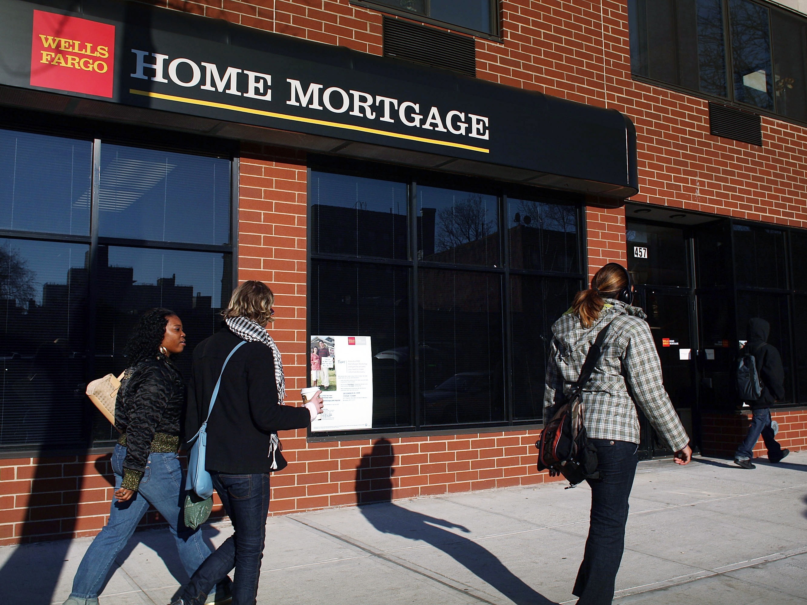 caption: Mortgage rates fell to their lowest level in 15 months this week, providing a little relief in the country's housing sector.