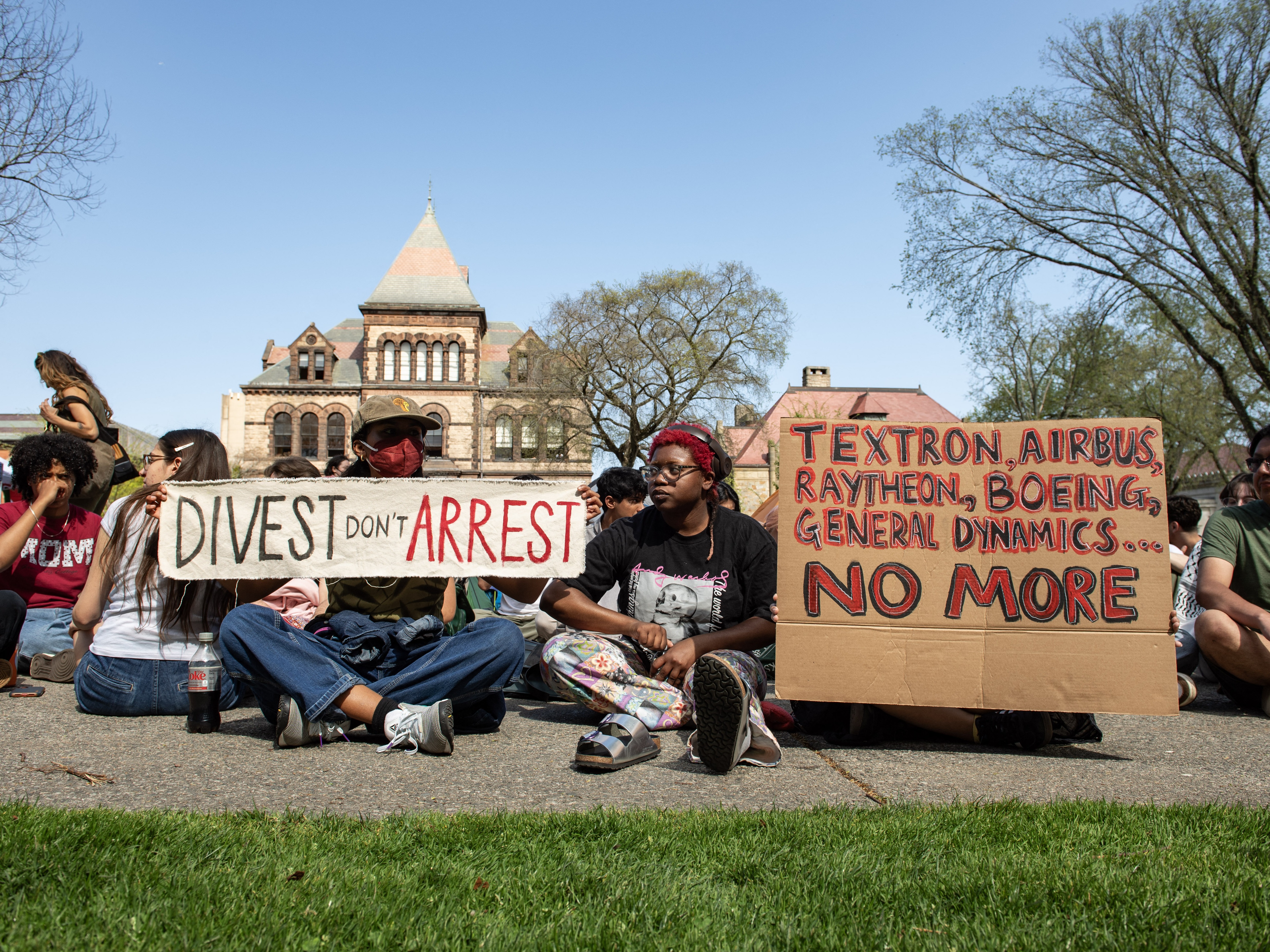caption: Pro-Palestinian protestors rally at Brown University in April as their delegation met with school leaders on campus in Providence, R.I.