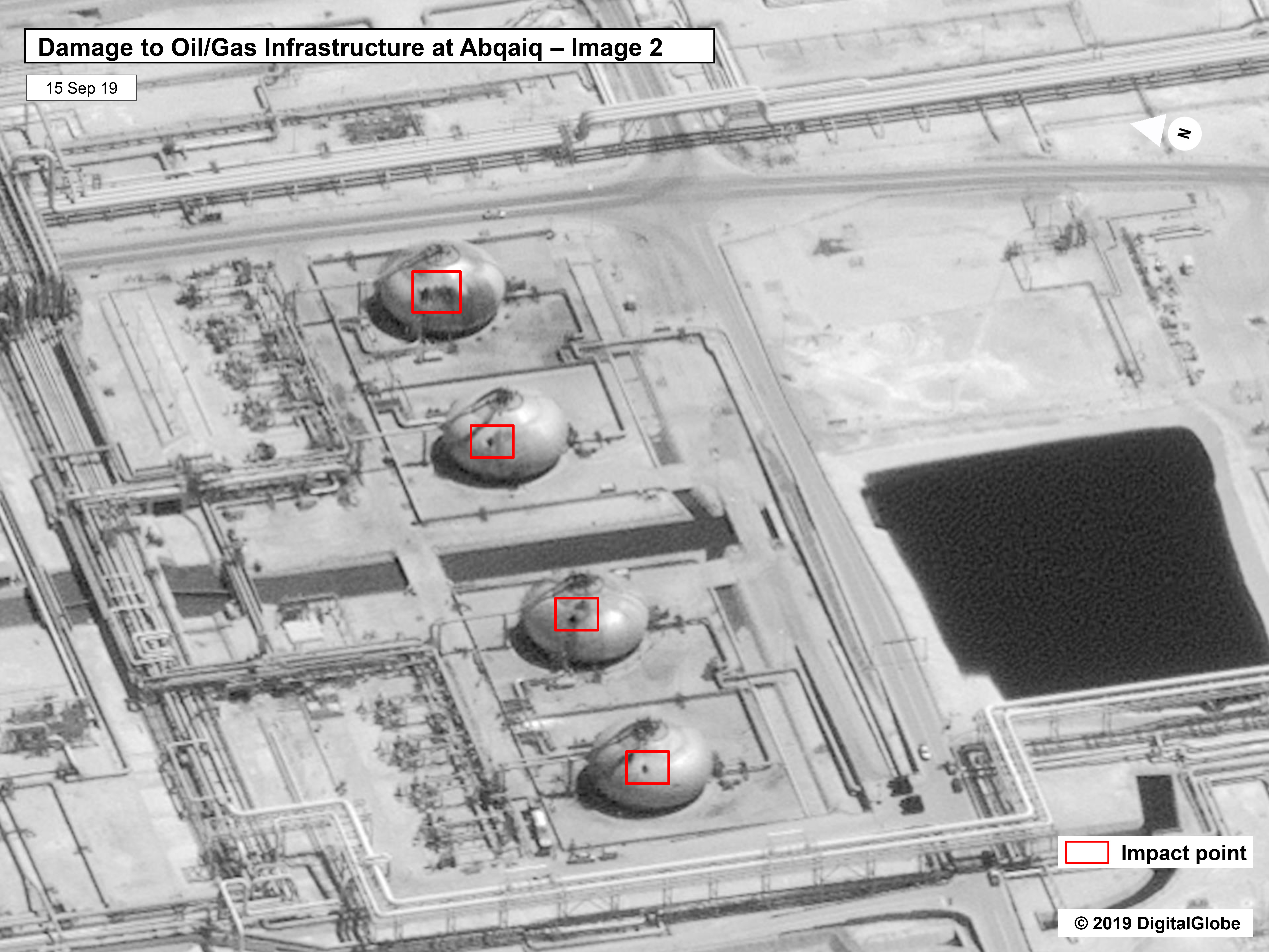 caption: Among the targets hit in the facility are apparently tanks used to hold flammable gas, and separation towers critical to its operation.