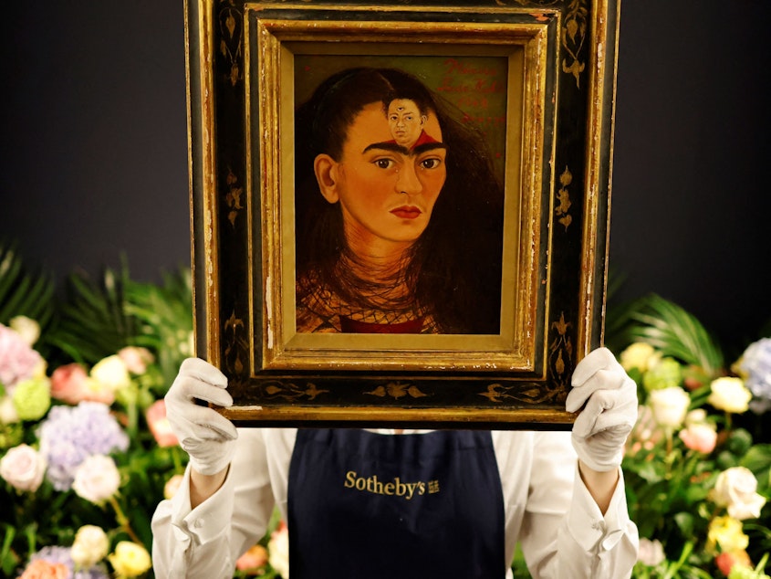 caption: Mexican painter Frida Kahlo's "Diego y yo" set a new auction record for art by a Latin American artist, selling for $34.9 million at Sotheby's on Tuesday night.