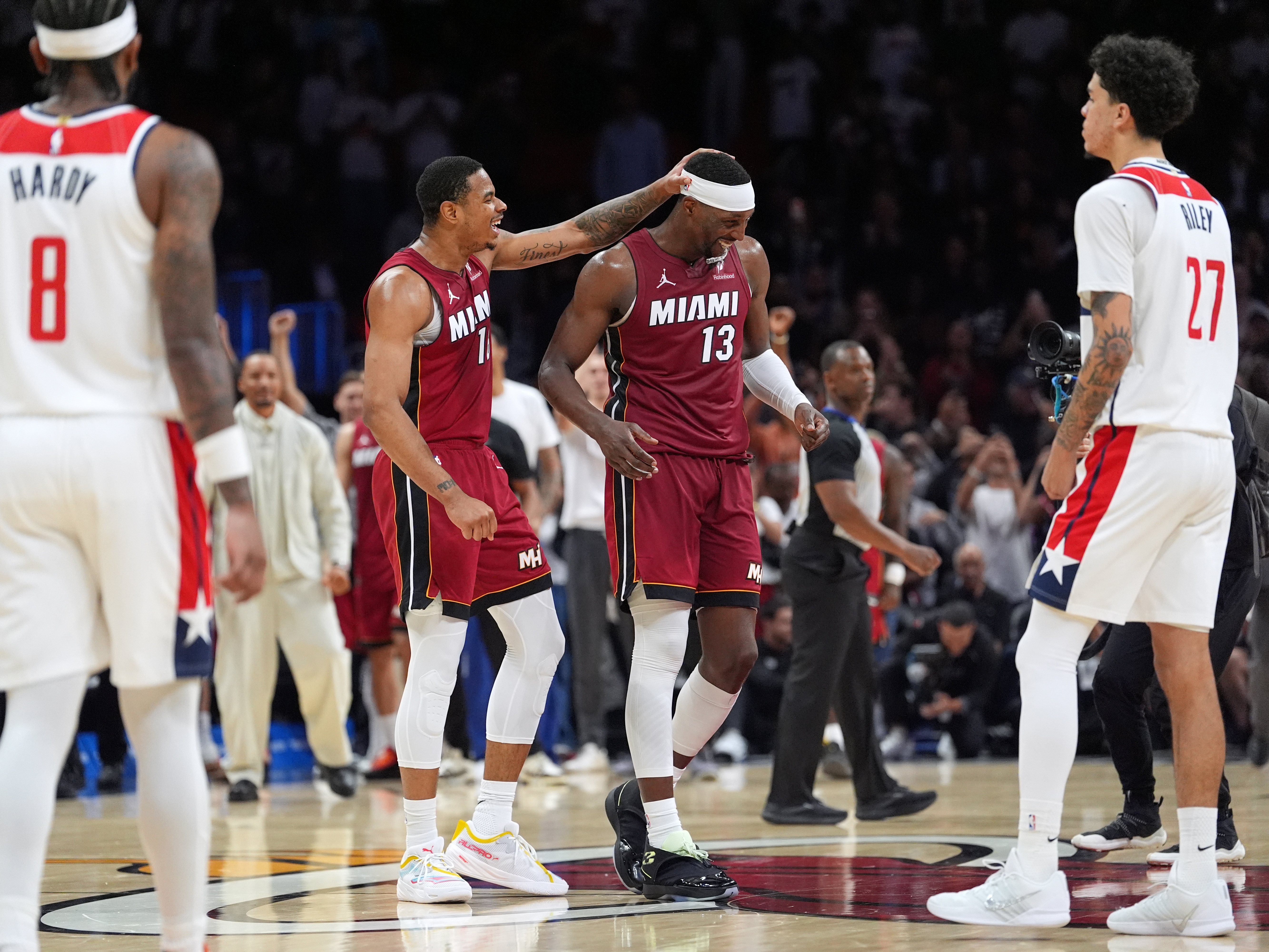 caption: Miami Heat center Bam Adebayo (13) is congratulated by forward Keshad Johnson (16) after reaching 83 points, the second-highest single game total in NBA history, in the second half of an NBA basketball game against the Washington Wizards, Tuesday, March 10, 2026, in Miami.