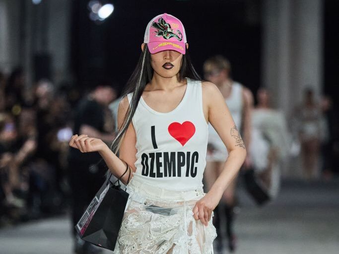 caption: A T-shirt from fashion brand Namilia shown during Berlin Fashion on July 3, 2024 sparked an outcry on the brand's Instagram, with readers noting that Ozempic is in short supply for people with a medical need for it.