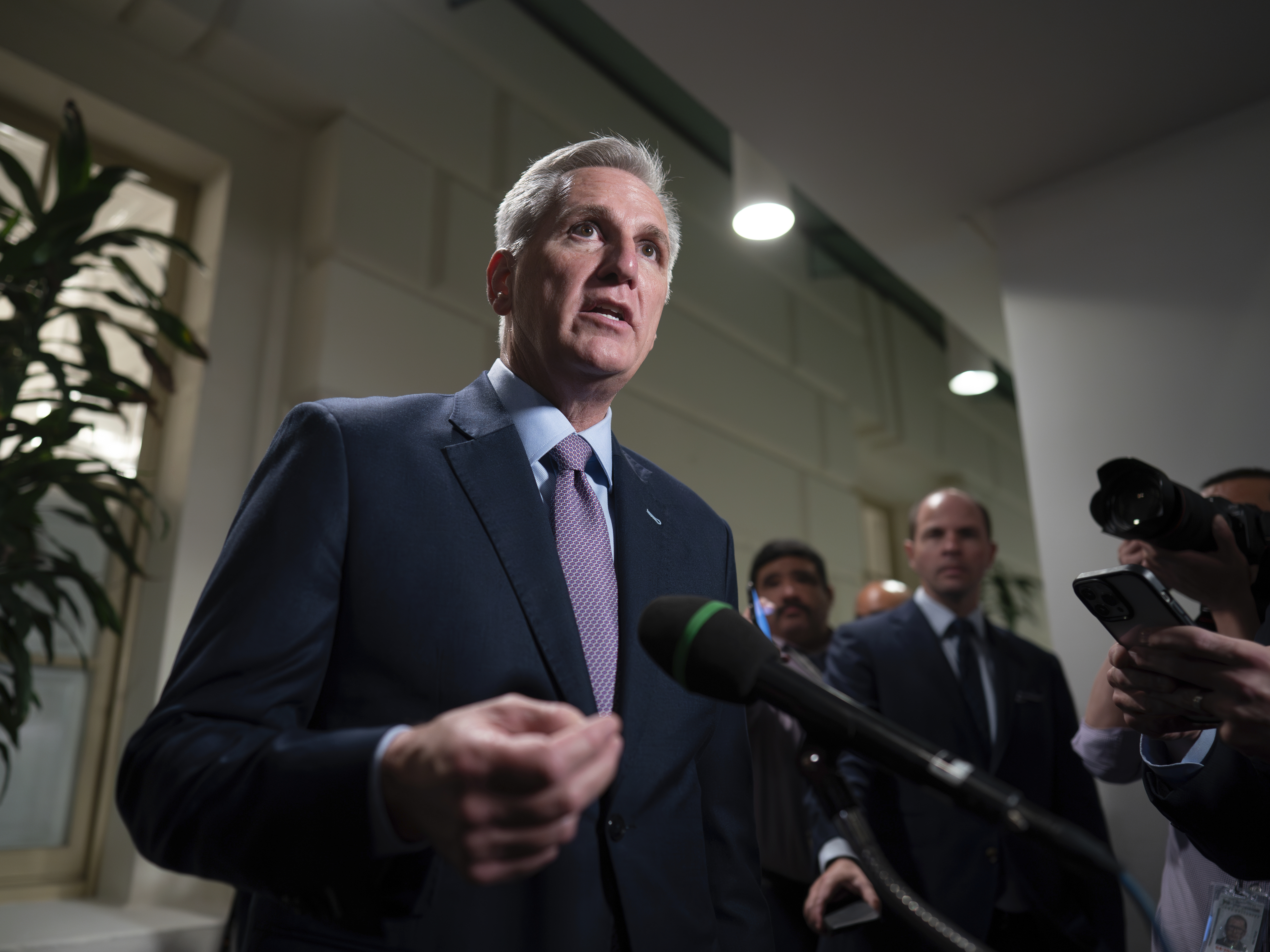 caption: Speaker of the House Kevin McCarthy, R-Calif., talks to reporters after a closed-door meeting Tuesday with Rep. Matt Gaetz, R-Fla., and other House Republicans after Gaetz filed a motion to oust McCarthy from his leadership role.