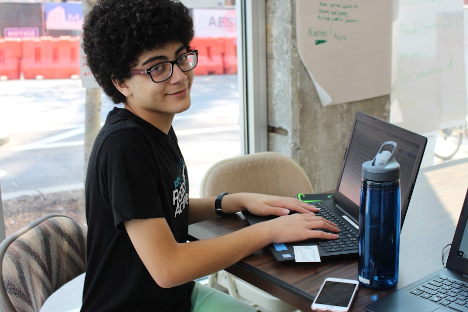 caption: The author, who is now 17, working at RadioActive's summer workshop. He was diagnosed with ulcerative colitis when he was 12.