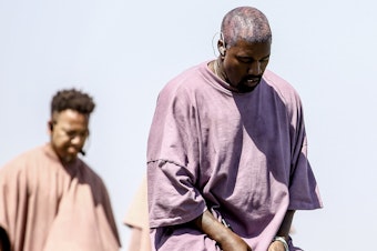 caption: Kanye West performs Sunday Service during the 2019 Coachella Valley Music And Arts Festival on April 21, 2019 in Indio, California.