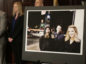 caption: A picture of Katelyn McClure, right, Mark D'Amico, center, and Johnny Bobbitt Jr. was displayed during a news conference in November. GoFundMe says it has refunded all donations to a campaign that featured a made-up story about Bobbitt, a homeless veteran.