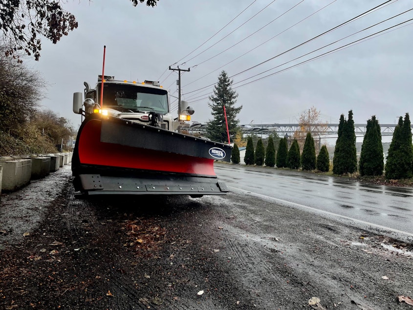 caption: A snow plow activated as Seattle expects snow, Nov. 29, 2022. 