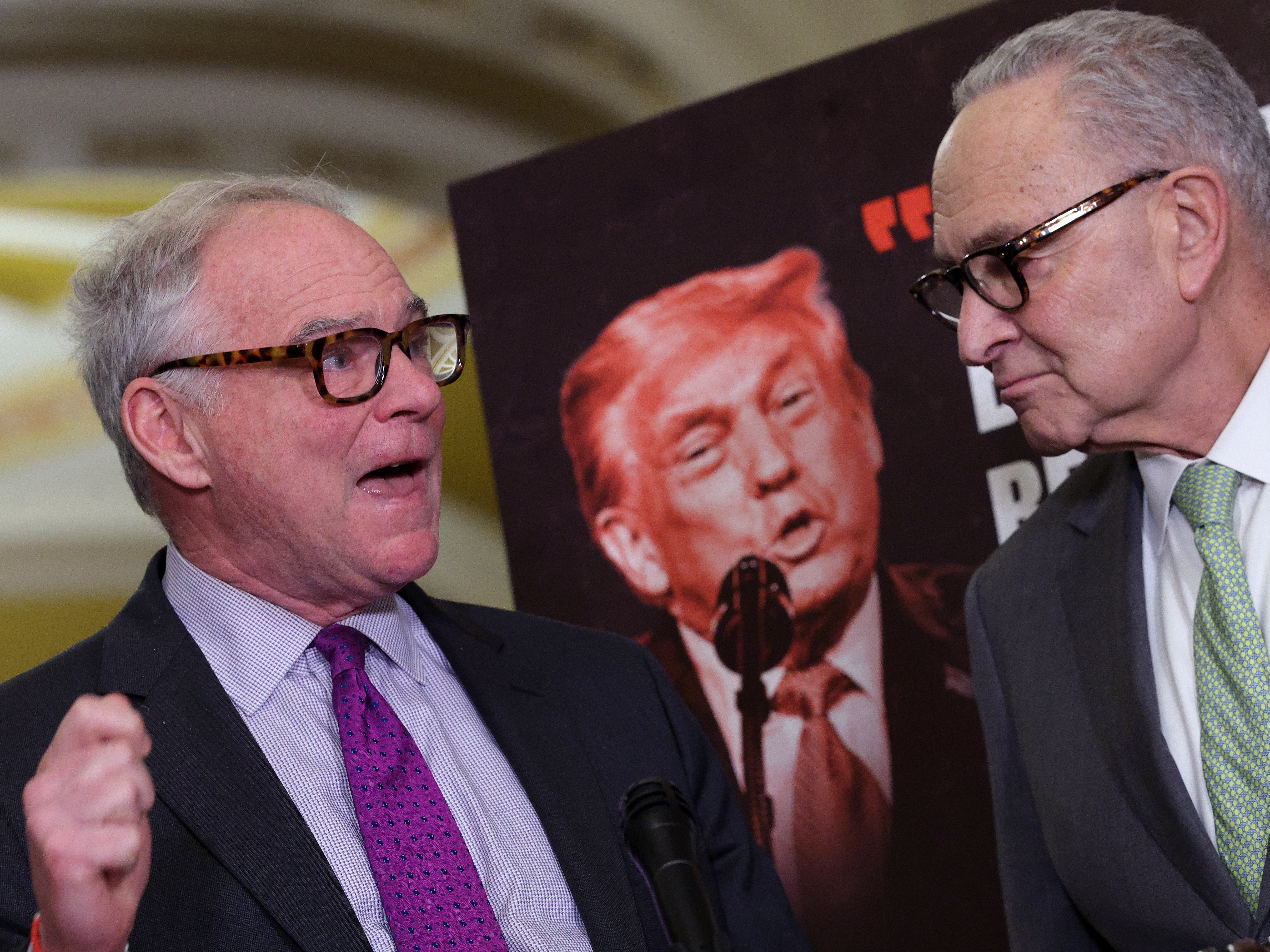 caption: Sen. Tim Kaine, D-Va., and U.S. Senate Minority Leader Chuck Schumer, D-N.Y., speak at the Capitol on Tuesday on the recent U.S. and Israeli attacks on Iran and the upcoming war powers vote.