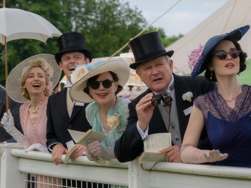 caption: Laura Carmichael, left, Harry Hadden-Paton, Elizabeth McGovern, Hugh Bonneville and Michelle Dockery in <em>Downton Abbey: The Grand Finale.</em>