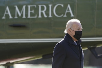caption: President Joe Biden walks to the Oval Office of the White House after stepping off Marine One on Jan. 10, 2022.