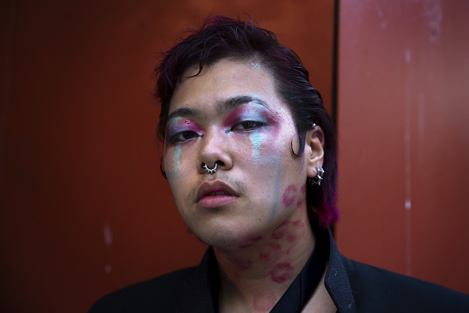 caption: Archie, drummer for the band Gender Envy, poses for a portrait after performing on Friday, June 23, 2023, during Trans Pride Seattle at Volunteer Park in Seattle. 