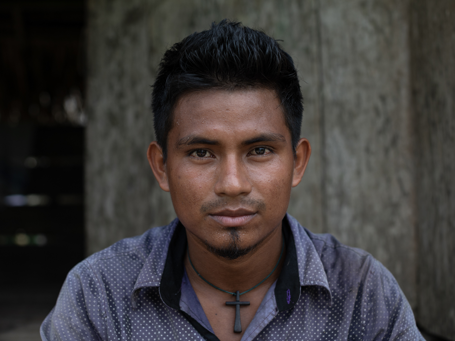 caption: Denister Zambrano (25) lieutenant governor of the Amazonian indigenous community of Suni Caño, Peru.