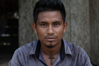 caption: Denister Zambrano (25) lieutenant governor of the Amazonian indigenous community of Suni Caño, Peru.