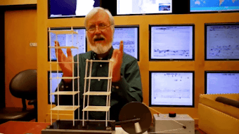 caption: Bill Steele demonstrates of the Pacific Northwest Seismic Network uses a shake table to show how earthquake forces gain power as they move away from the ground. But under the ground, it's a different story.