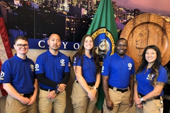 caption: This week Seattle will begin dispatching these community crisis responders to certain 911 calls alongside police officers.