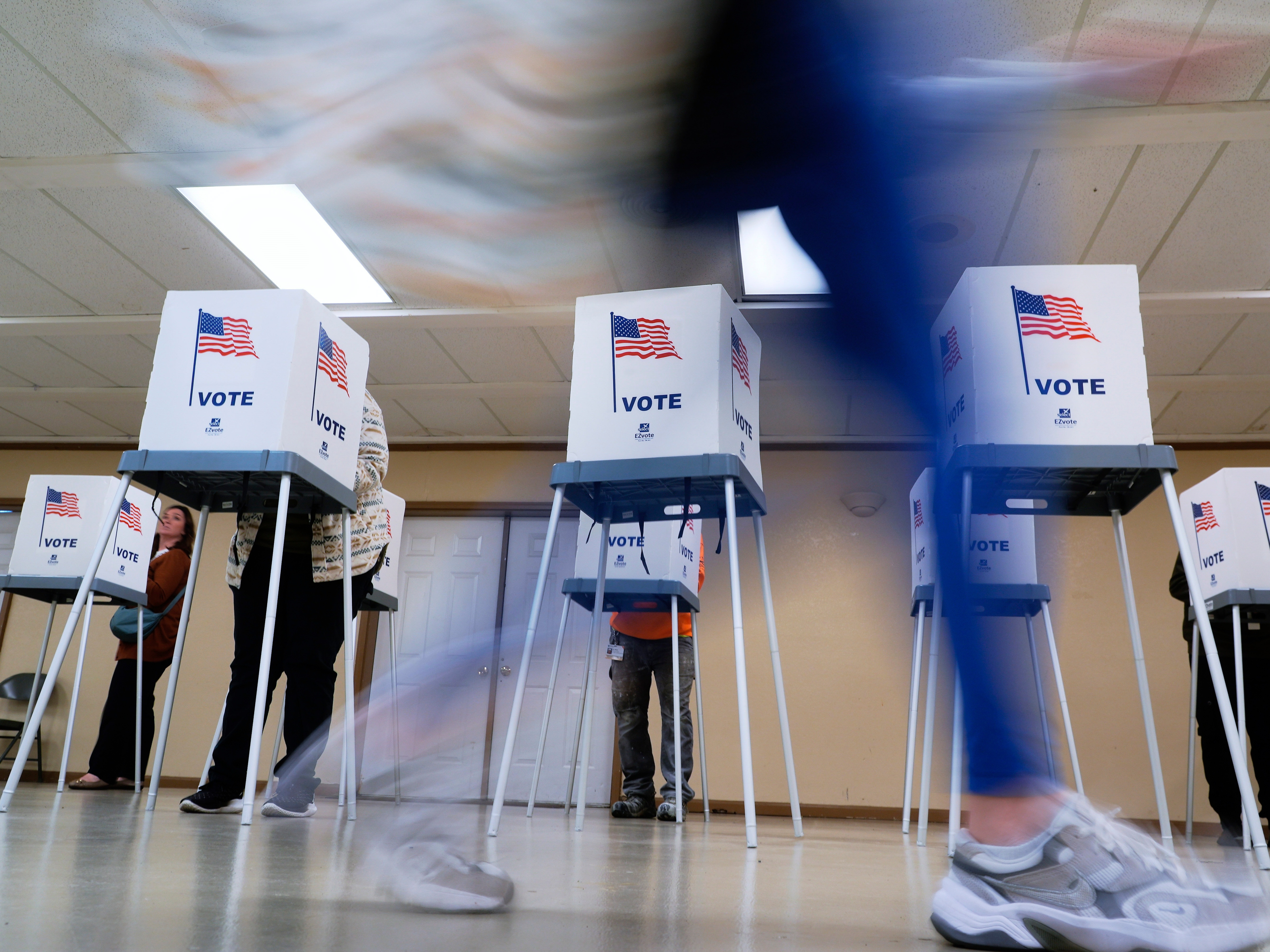 caption: In this file photo, voters cast their ballots in Oak Creek, Wis., on Nov. 5, 2024. On Tuesday, Apr. 8, Wisconsin voters elected a new justice to the state's supreme court, expanding the majority for liberal leaning justices as part of a larger trend of Democratic overperformance in elections since President Trump took office.