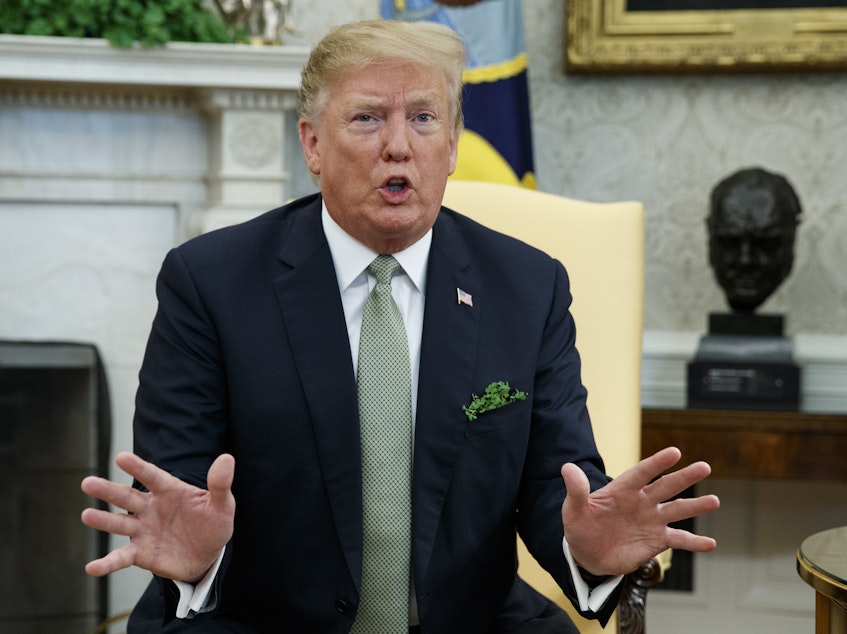 caption: President Trump said Thursday he would "probably have to veto" the resolution blocking his emergency declaration to build a wall on the U.S.-Mexico border.