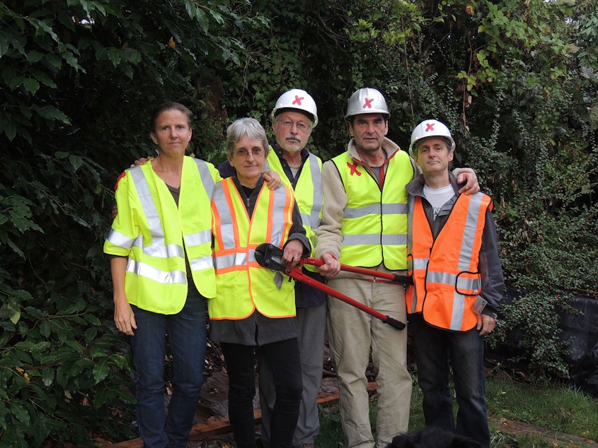 caption: The five climate activists arrested after shutting down Canada-to-U.S. pipelines pose for a photo. They were identified by Climate Direct Action as (left to right): Emily Johnson, Annette Klapstein, Leonard Higgins, Ken Ward and Michael Foster.
