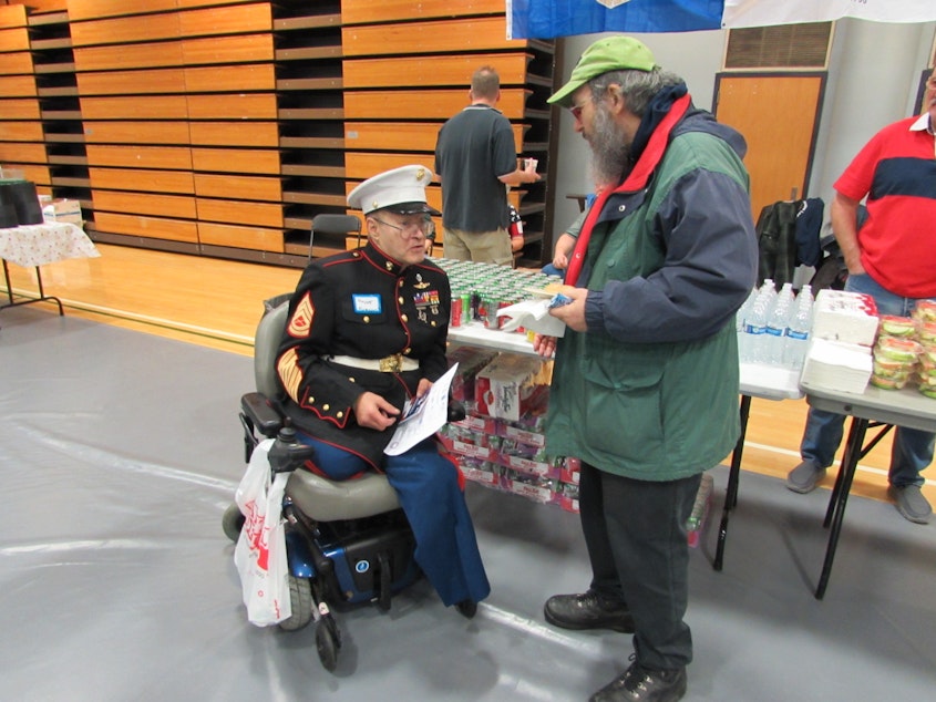 caption: Marine Veteran Vincent Romano with a fellow veteran. Romano served between 1967 and 2006.