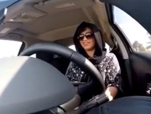 caption: This Nov. 30, 2014, image made from video released by Loujain Alhathloul, shows her driving in the United Arab Emirates toward the border with Saudi Arabia. Her siblings have visited the United States this week to receive an award in her honor and to raise further awareness of her case.