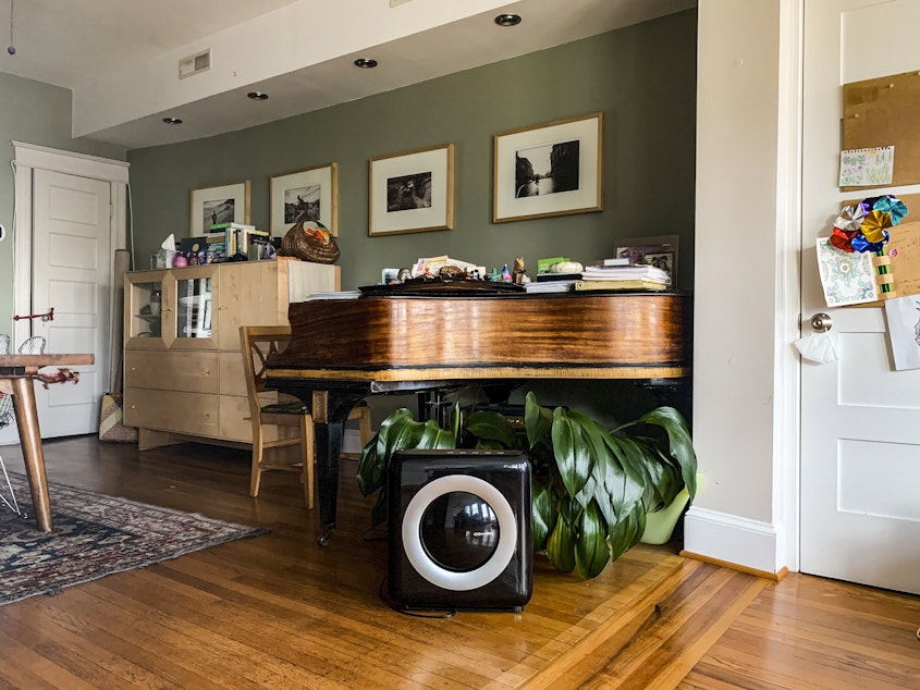 caption: As people spend more time together indoors with the changing of the seasons, could an air cleaner provide an added layer of protection against the transmission of the coronavirus by removing a percentage of viral particles from the air?