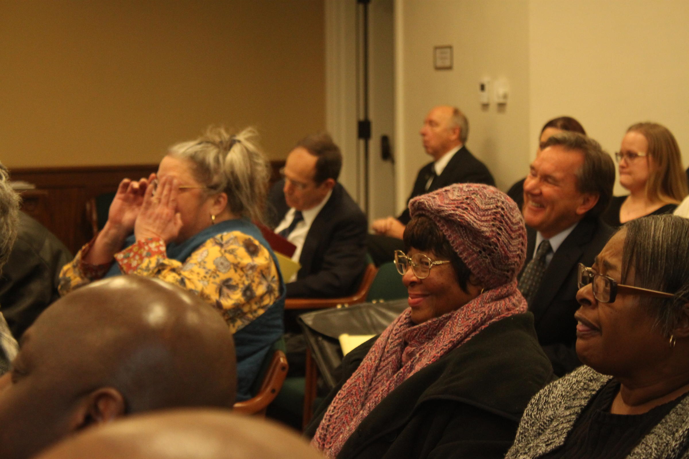caption: Jeanette Sorenson smiles after the state Clemency and Pardons Board recommends her son, Prenters Broughton, for early release on Thursday, March 7. Broughton has served 19 years in prison under the state’s three-strikes law, and his petition now goes to the governor. CREDIT: MAX WASSERMAN