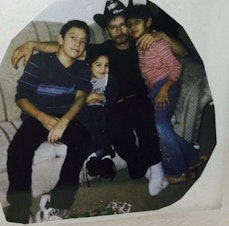 caption: Roberta (far right) with her father and two brothers. The younger brother went to Mexico with her parents.