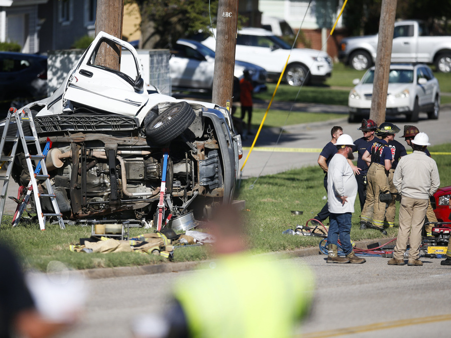 caption: Emergency workers work the scene of a fatal car accident in August 2021 in Tulsa, Okla. Nearly 43,000 people died in U.S. traffic crashes in 2021, with deaths due to speeding and impaired or distracted driving on the rise.