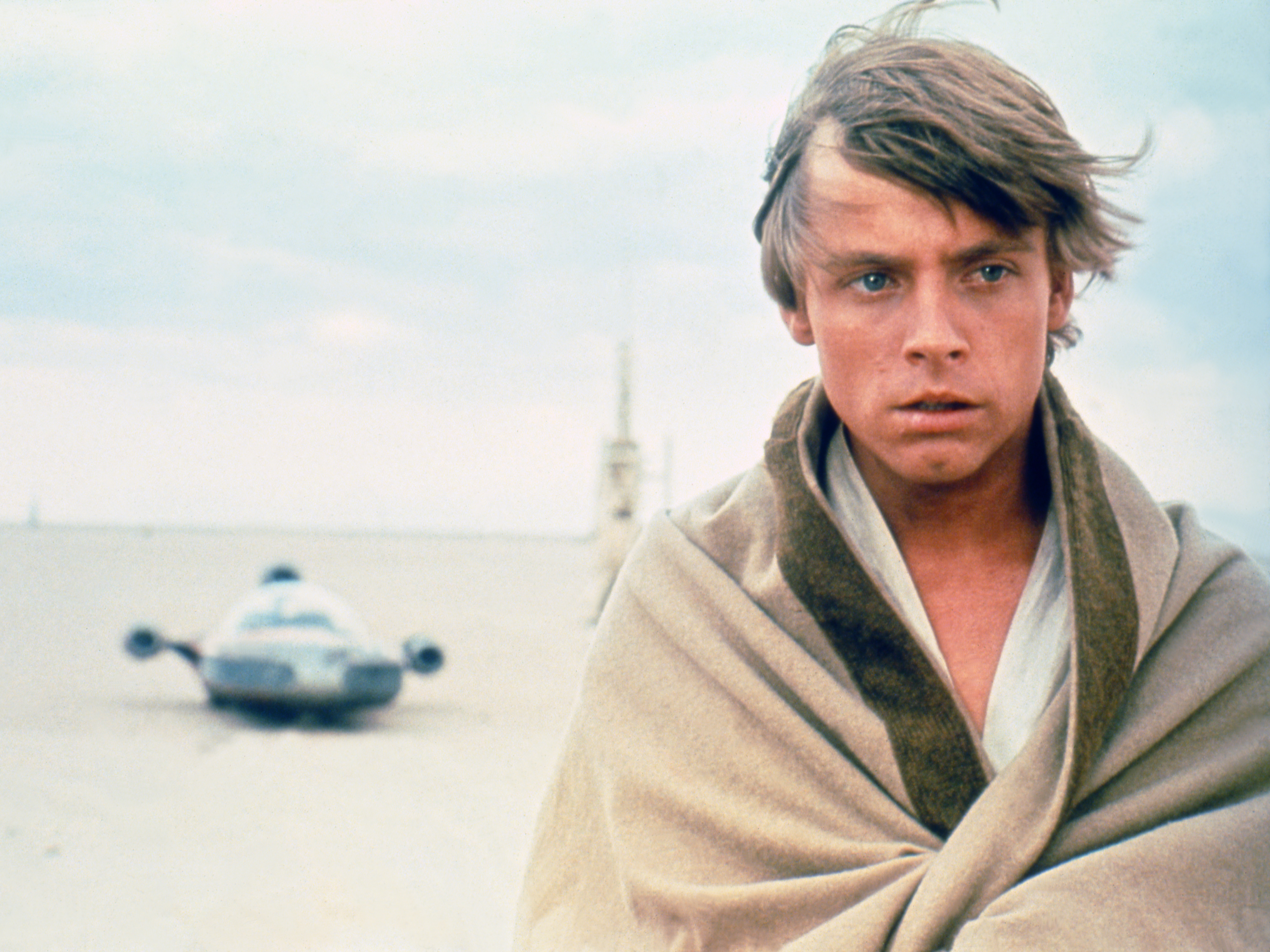 caption: Actor Mark Hamill on the set of <em>Star Wars</em>.