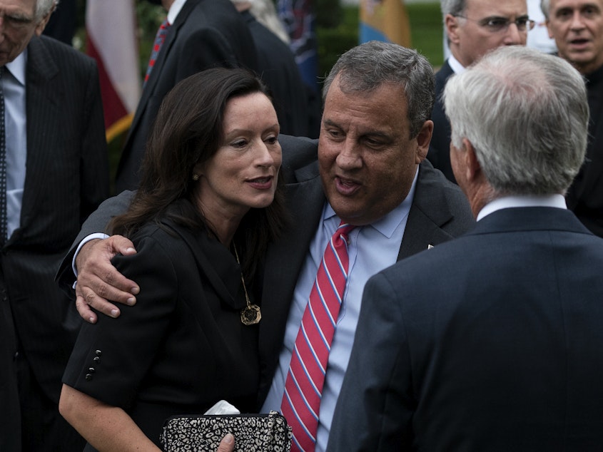 caption: Chris Christie announced he was released from a N.J. hospital Saturday, a week after checking in for mild COVID-19 symptoms. The former New Jersey governor was one of several Republicans to test positive after attending a Sept. 26 event (pictured above) at the White House.