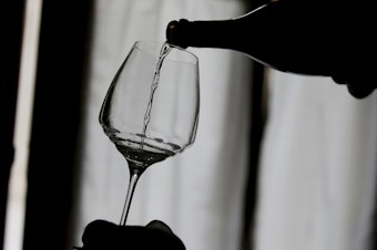 caption: American adults over 30 say they're drinking 14% more often during the coronavirus pandemic, according to a report in the journal <em>JAMA Network Open</em>.