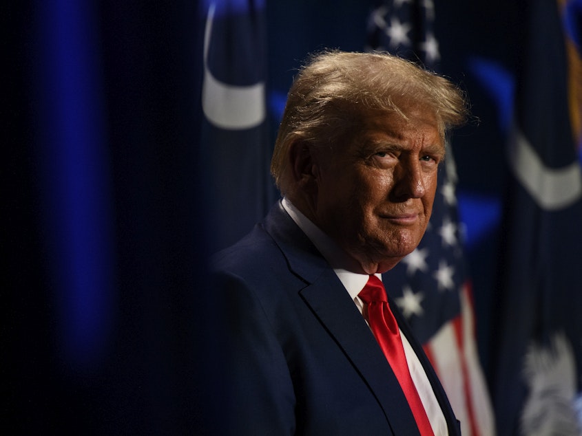 caption: Former President Donald Trump speaking at the 56th Annual Silver Elephant Dinner hosted by the South Carolina Republican Party on Saturday in Columbia, S.C.