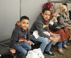 caption: Members of the Alhamdan family arrived at Sea-Tac Airport recently. They joined a tiny community of about 25 Syrian refugees who've arrived in Washington in the past few years.