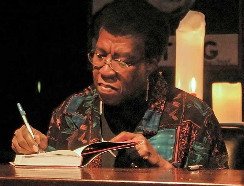 caption: Sci-fi author Octavia E. Butler signs a copy of "The Fledgling" on October 25, 2005.