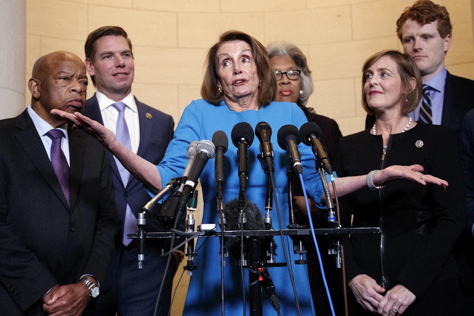 caption: House Minority Leader Nancy Pelosi, D-Calif., joined by from left, Rep. John Lewis, D-Ga., Rep. Eric Swalwell, D-Calif., Rep. Joyce Beatty, D-Ohio., Rep. Kathy Castor, D-Fla., and Rep. Joe Kennedy, D-Mass., gestures as she speaks to media at Longworth House Office Building on Capitol Hill in Washington, Wednesday, Nov. 28, 2018, to announce her nomination by House Democrats to lead them in the new Congress. (Carolyn Kaster/AP)
