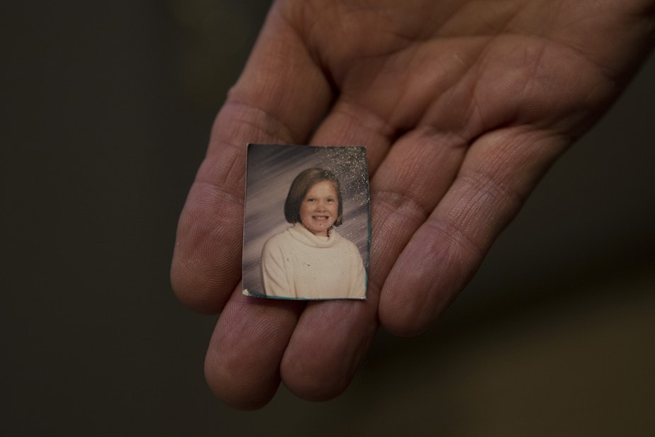 caption: Greg Beck holds an old photograph of Piper on Tuesday, January 22, 2019, at their home on Whidbey Island.