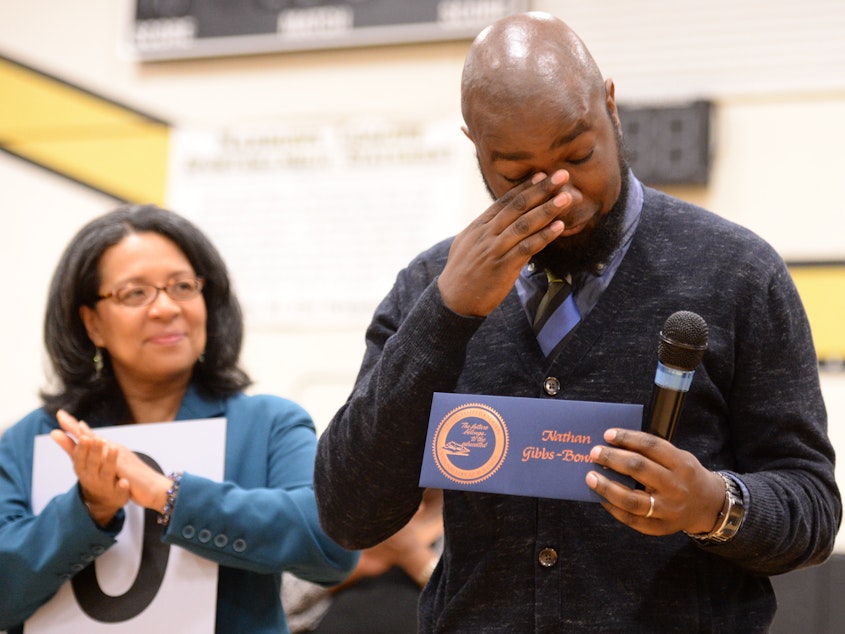 caption: Nate Gibbs-Bowling of Lincoln High School in Tacoma receives a $25,000 Milken Educator Award in April 2014. He was also named the 2016 Washington state teacher of the year.