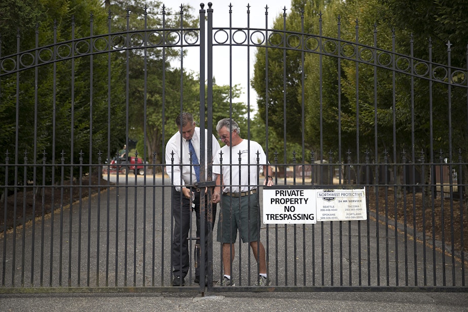 caption: The gates are locked at Lake View Cemetery on Thursday, August 17, 2017, in Seattle, where a monument to the Confederacy has become controversial after protests turned violent in Charlottesville last weekend.