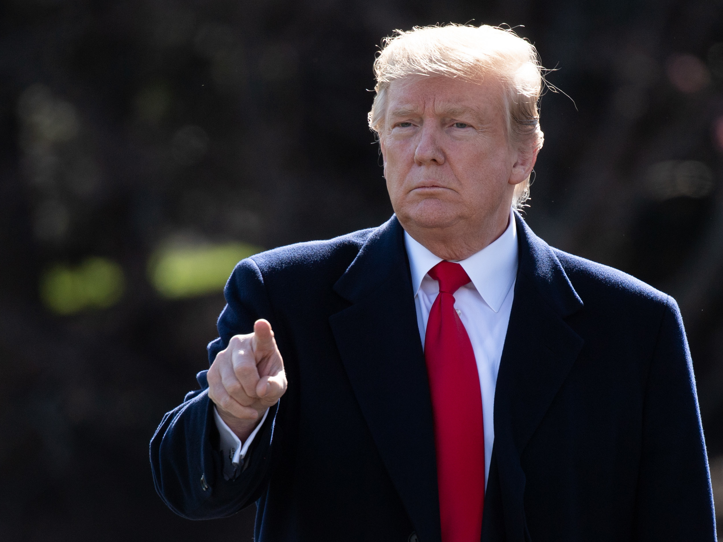 caption: President Trump speaks to the media Thursday prior to departing the White House for a Michigan campaign rally. In a presidential memorandum released the same day, Trump temporarily extended a program that gives Liberians protected status from deportation.