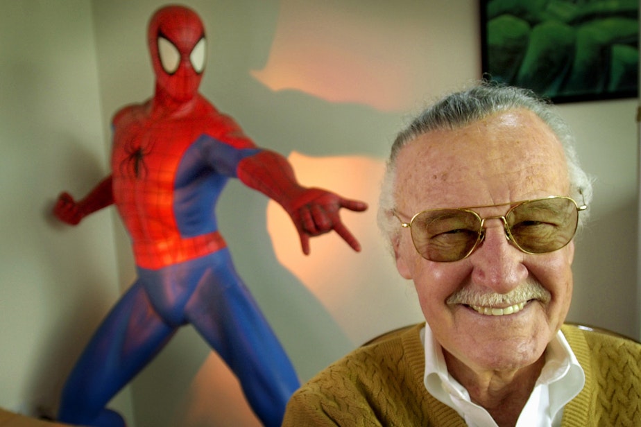 caption: Stan Lee, 79, creator of comic-book franchises such as "Spider-Man," "The Incredible Hulk" and "X-Men," smiles during a photo session April 16, 2002, in his office in Santa Monica, Calif. (AP Photo/Reed Saxon)