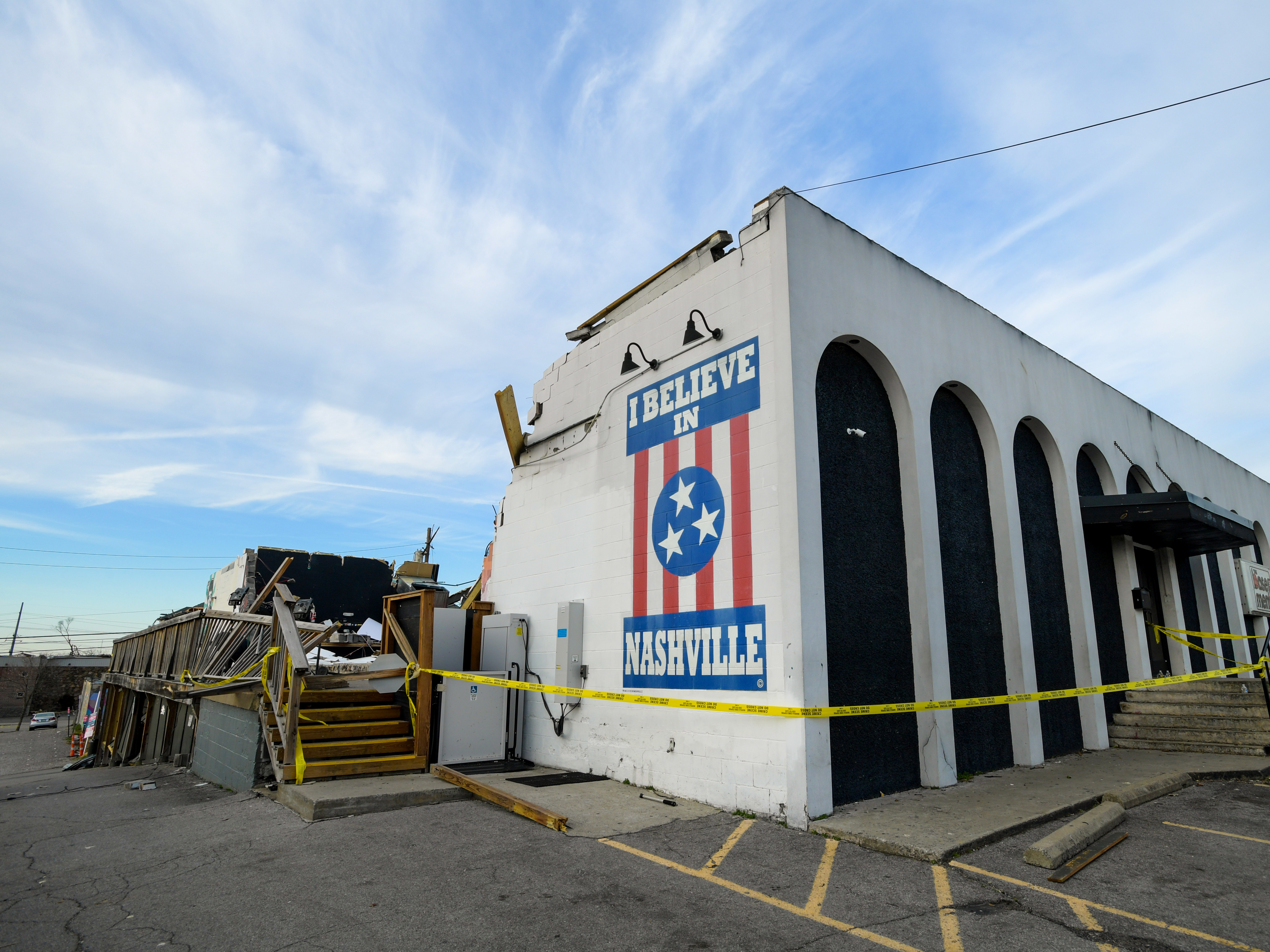 caption: The destroyed exterior of The Basement East following a tornado that struck in the early hours of March 3, 2020 in Nashville. At least 24 people have reportedly been killed, with many more still missing.