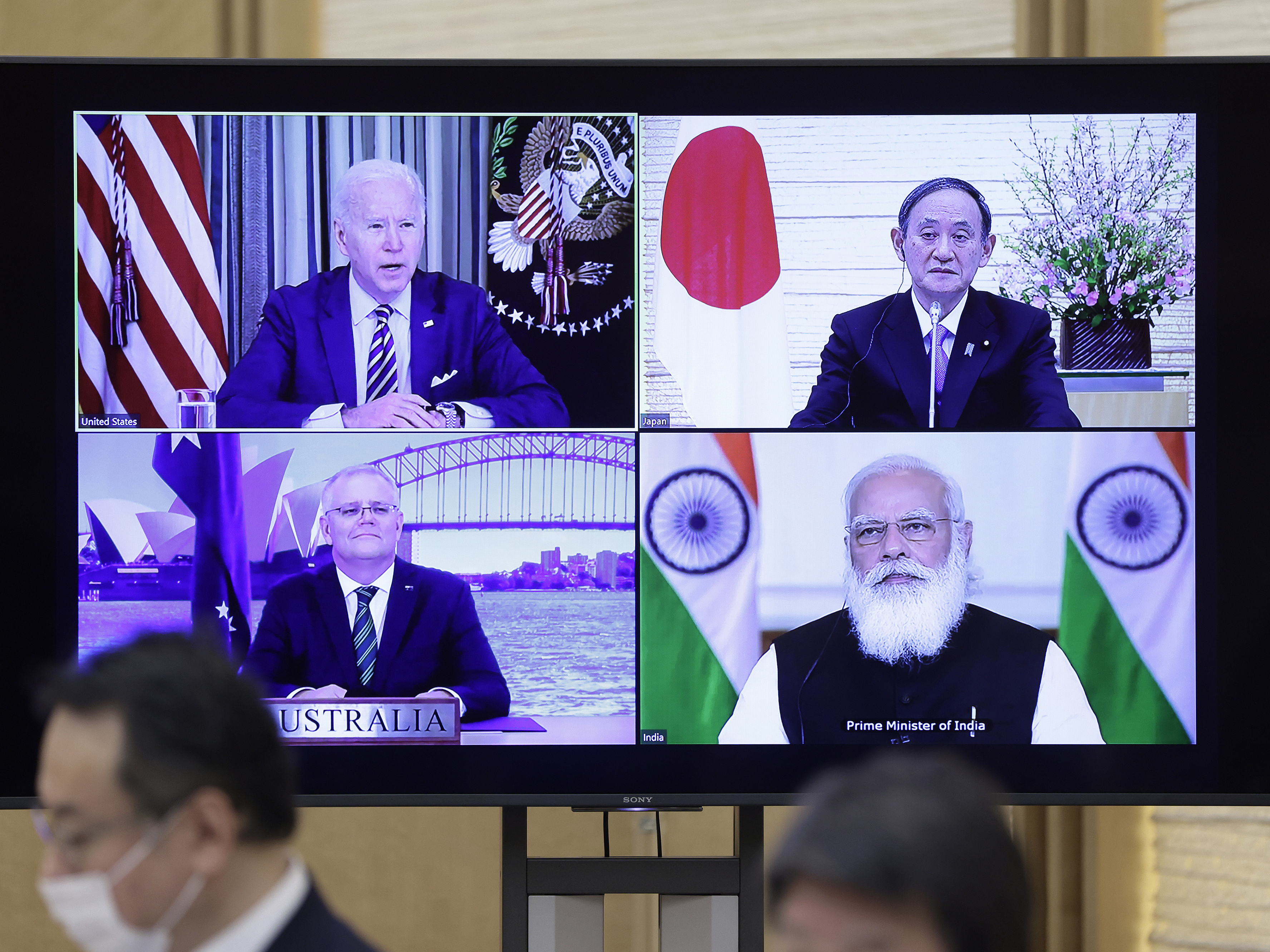 caption: President Biden (clockwise from top left), Japanese Prime Minister Yoshihide Suga, Indian Prime Minister Narendra Modi and Australian Prime Minister Scott Morrison participate in the virtual Quadrilateral Security Dialogue or Quad meeting on Friday.