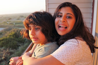 caption: Saba Ali (left) with her older sister Huma. 
